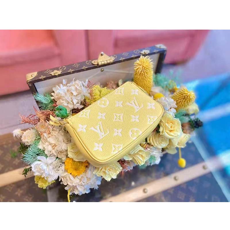 Louis Vuitton LV Women Mini Pochette Accessoires Yellow Monogram Empreinte Embossed Supple Grained Cowhide Clutch
