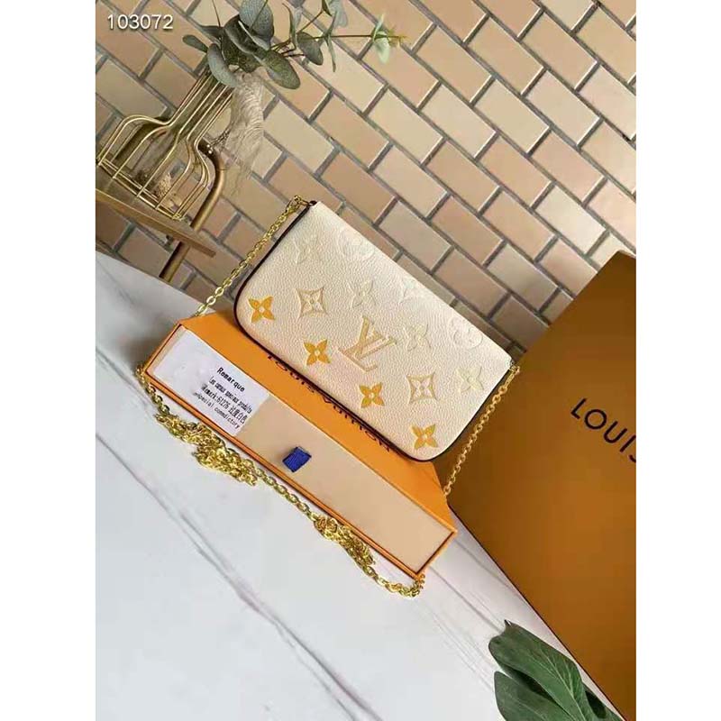 Louis Vuitton Women Félicie Pochette Cream Saffron Monogram Empreinte Embossed Supple Grained Cowhide Clutch
