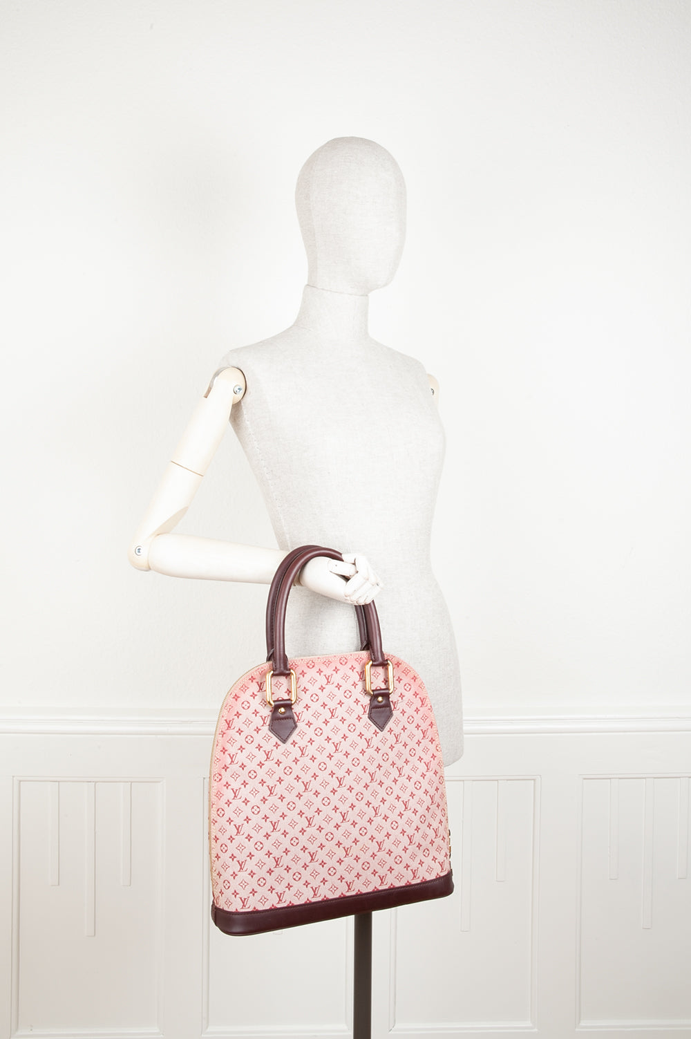 LOUIS VUITTON Alma Haut Mini Lin Sepia Handbag