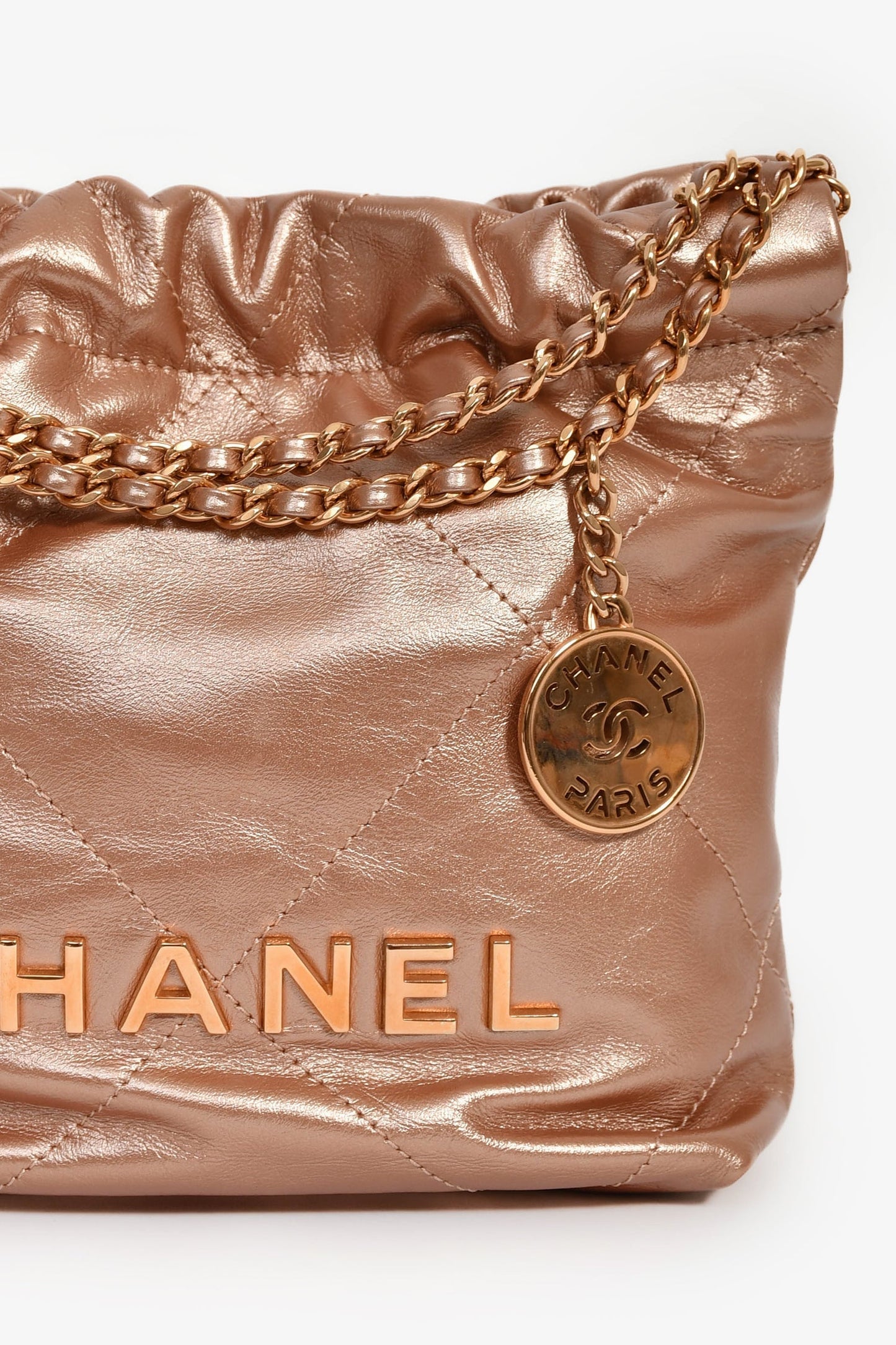 Chanel™ 2021+ Rose Metallic Quilted Calfskin Mini Chanel 22 Hobo Bag