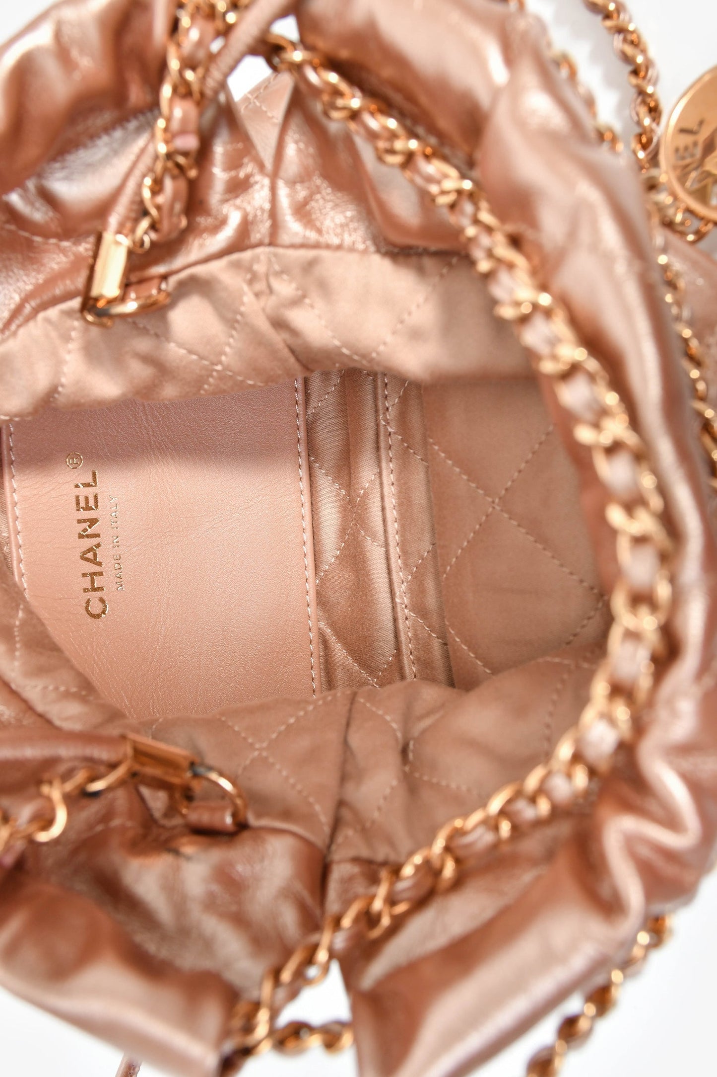 Chanel™ 2021+ Rose Metallic Quilted Calfskin Mini Chanel 22 Hobo Bag