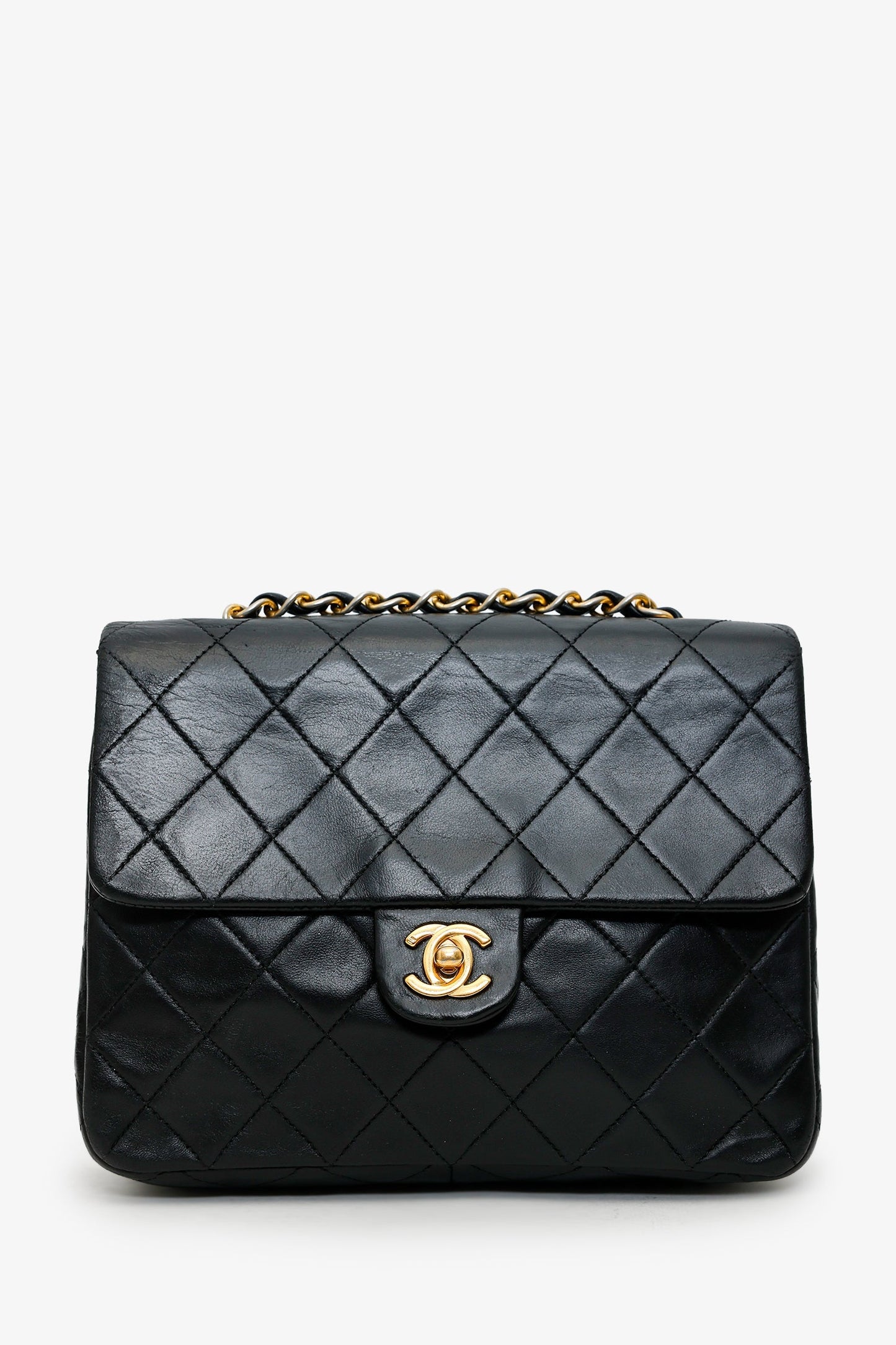 Chanel™ Black Quilted Lambskin Mini Square Flap Bag