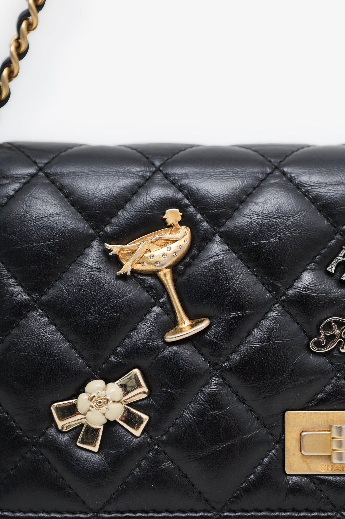 Chanel™ Black Quilted Aged Calfskin Leather Lucky Charms 2.55 Reissue Wallet on Chain