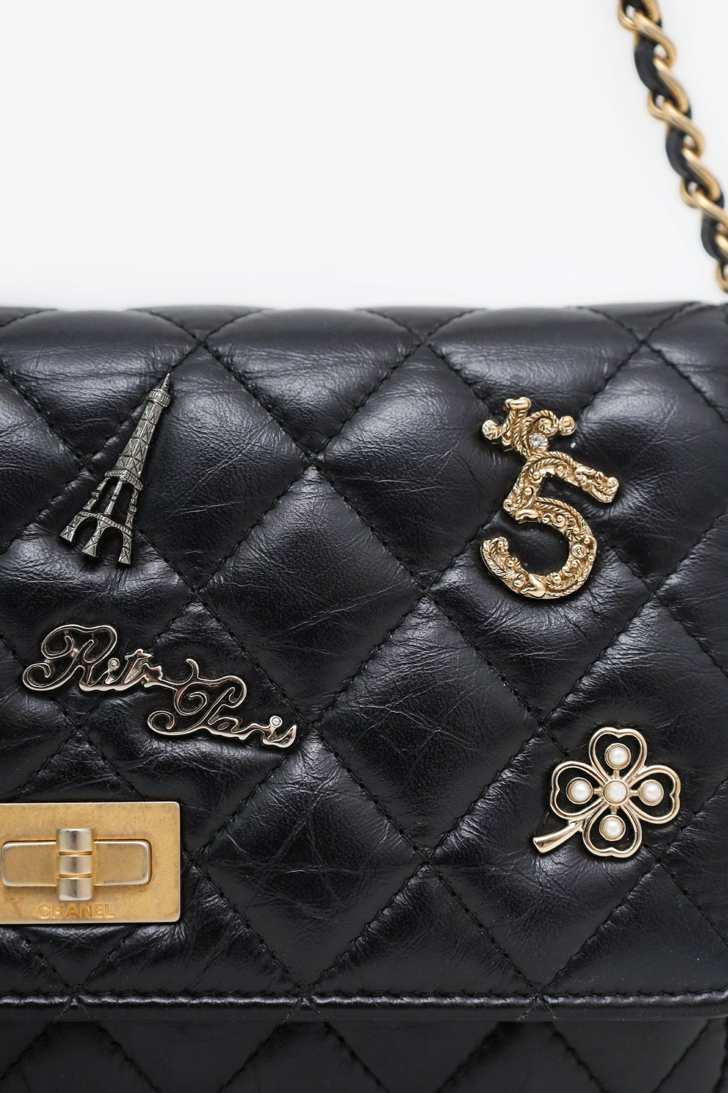 Chanel™ Black Quilted Aged Calfskin Leather Lucky Charms 2.55 Reissue Wallet on Chain