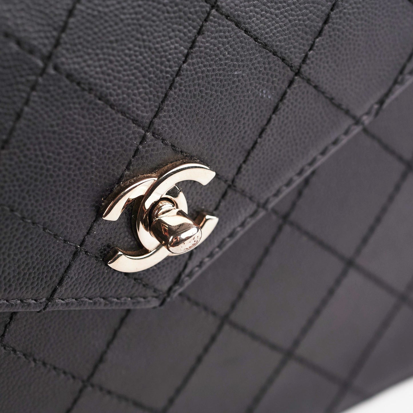 ITEM 31 - Chanel  Square Black Top Handle Bag
