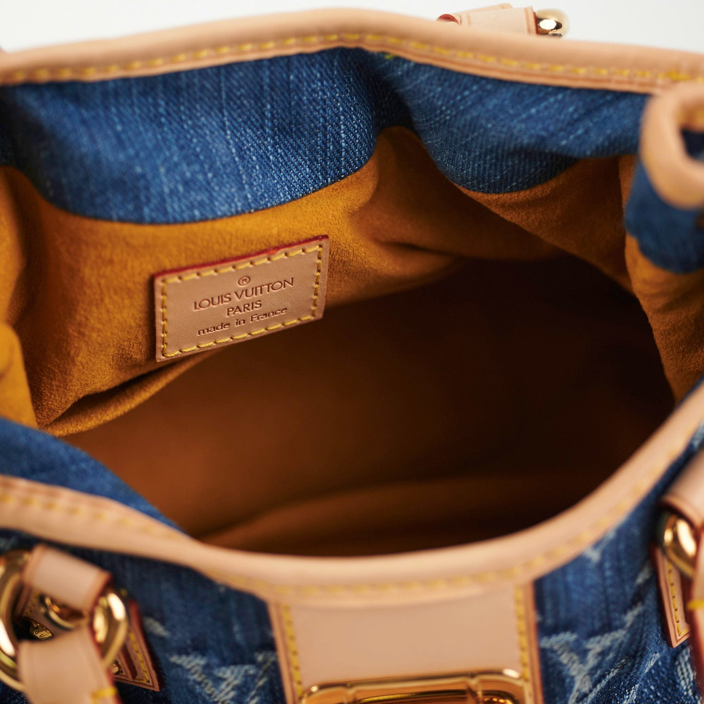 Louis Vuitton Pleaty Denim Handbag