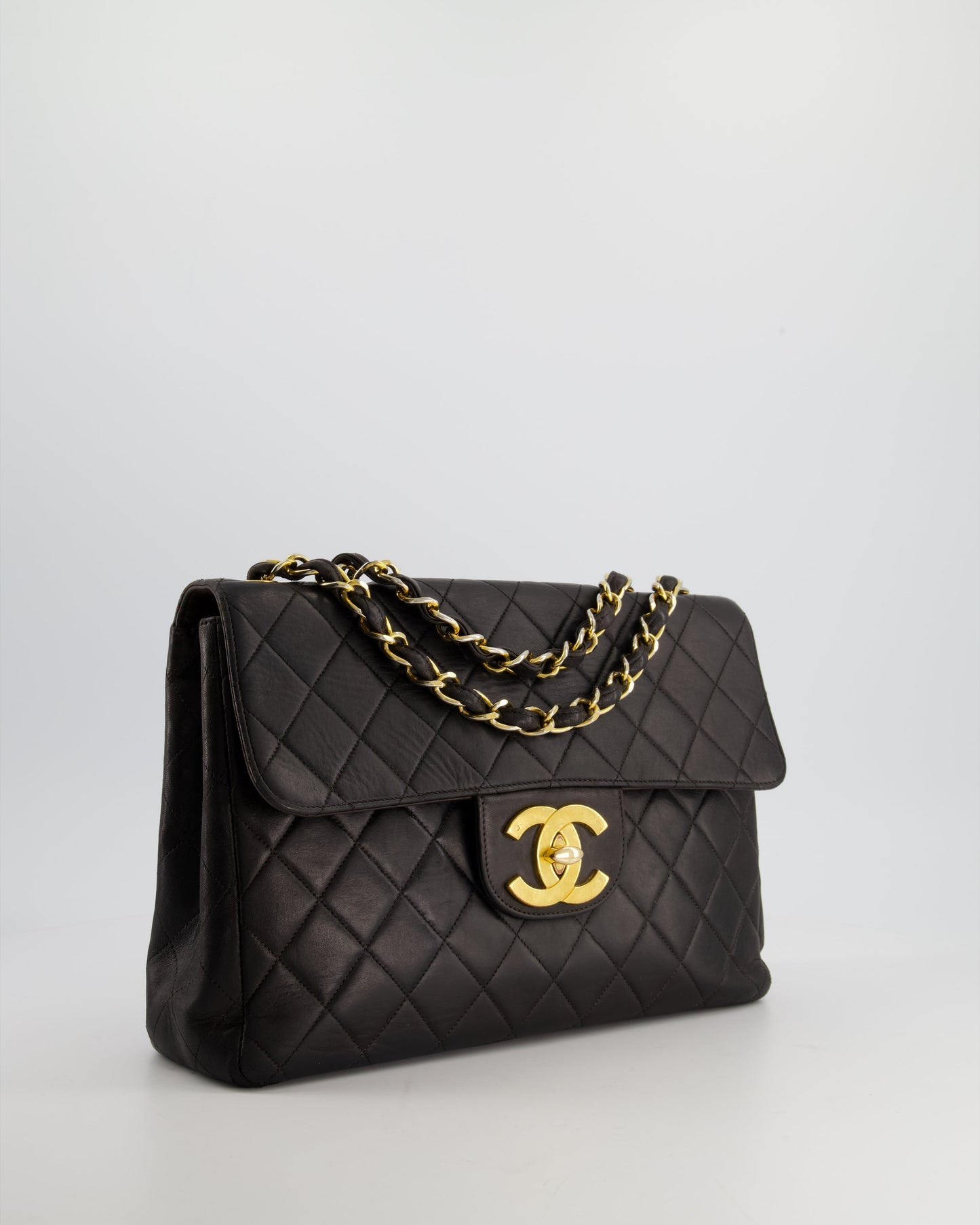 Chanel Black   Maxi Mademoiselle Single Flap Bag in Lambskin with 24K Gold Hardware