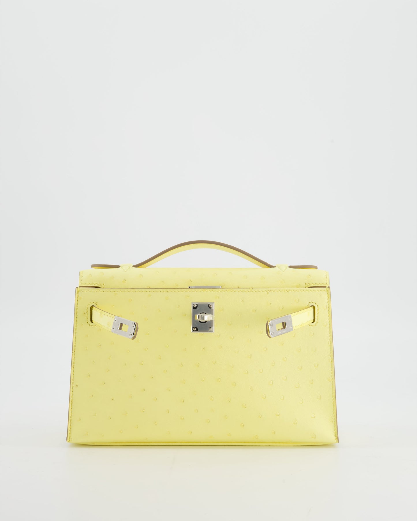 Hermès Kelly Pochette Bag in Limoncello Ostrich Leather with Palladium Hardware