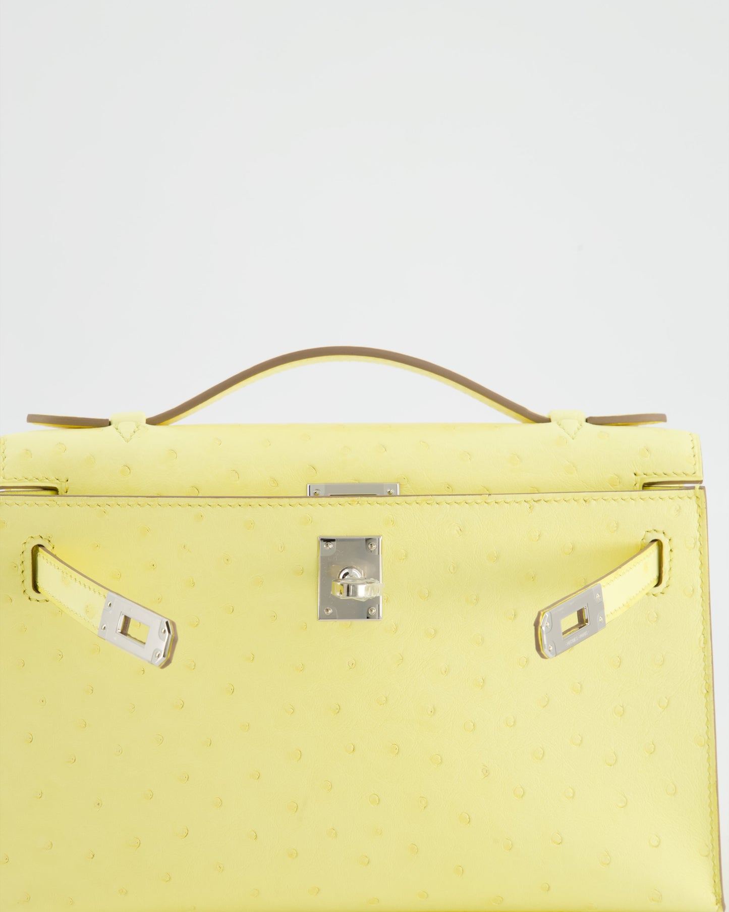 Hermès Kelly Pochette Bag in Limoncello Ostrich Leather with Palladium Hardware