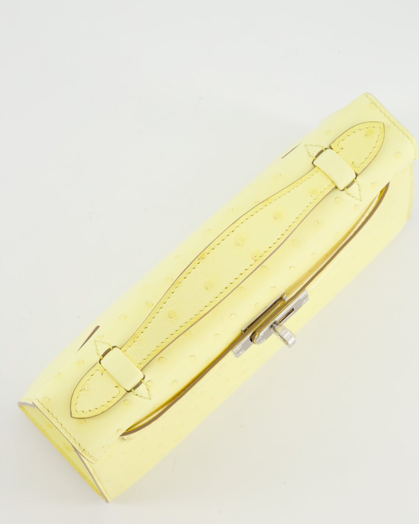 Hermès Kelly Pochette Bag in Limoncello Ostrich Leather with Palladium Hardware