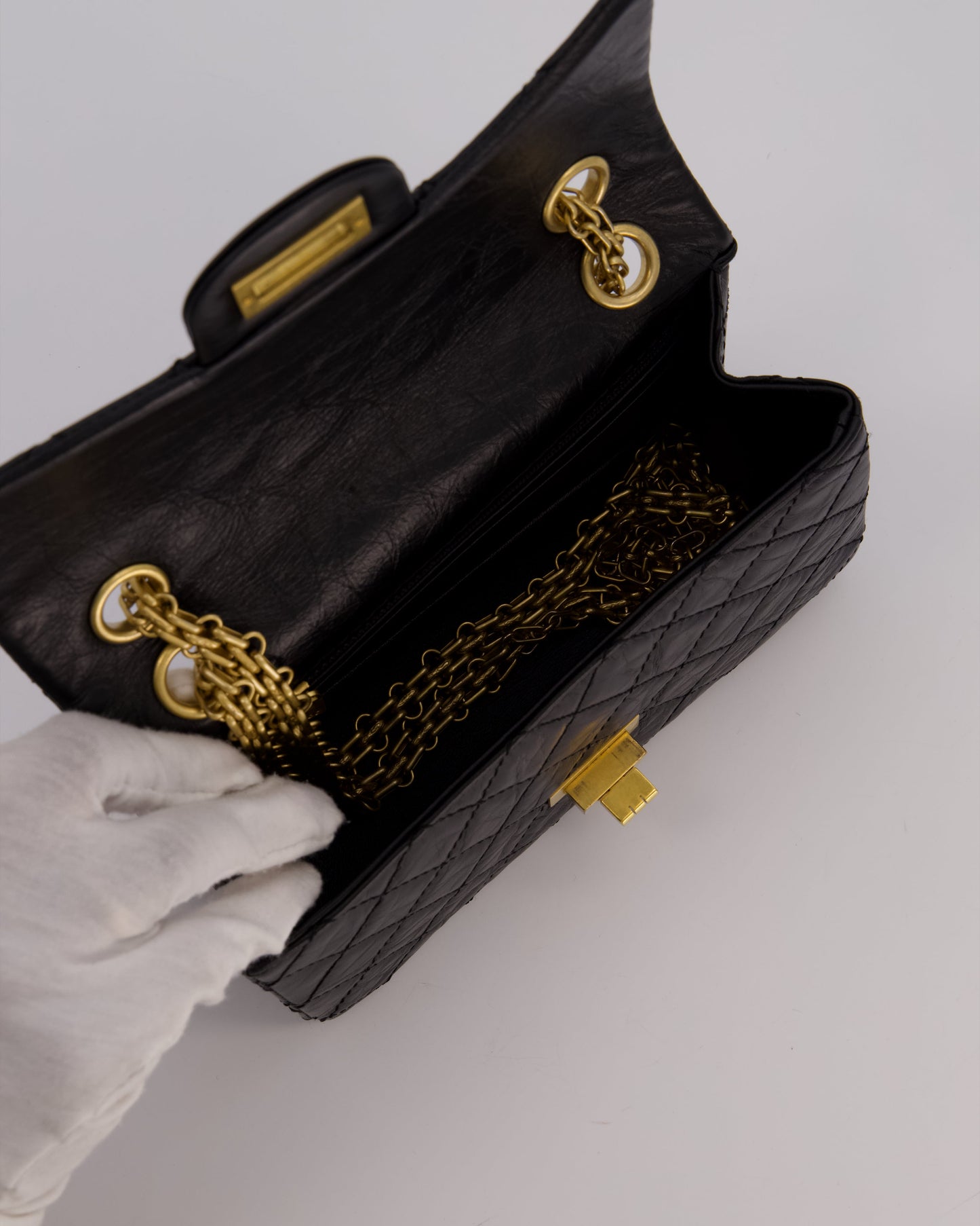 Chanel Mini 2.55 Reissue Flap Bag in Black Aged Calfskin Leather with Gold Hardware
