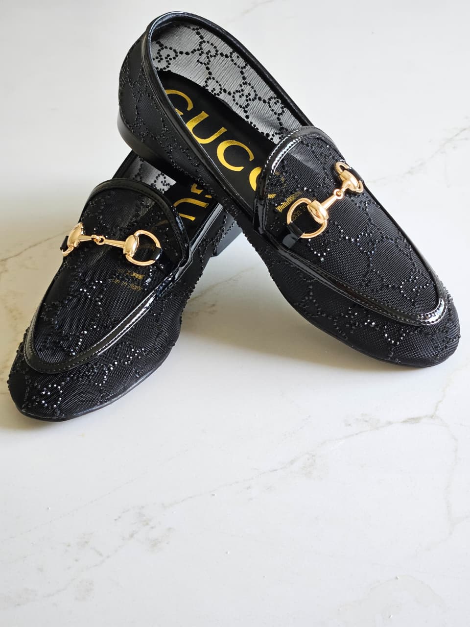 GUCCI