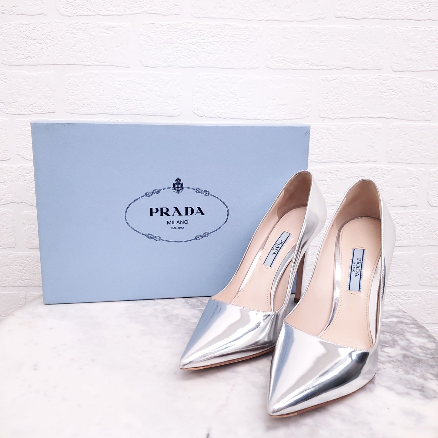 PRADA METALLIC SILVER HEELS - SIZE 37.5