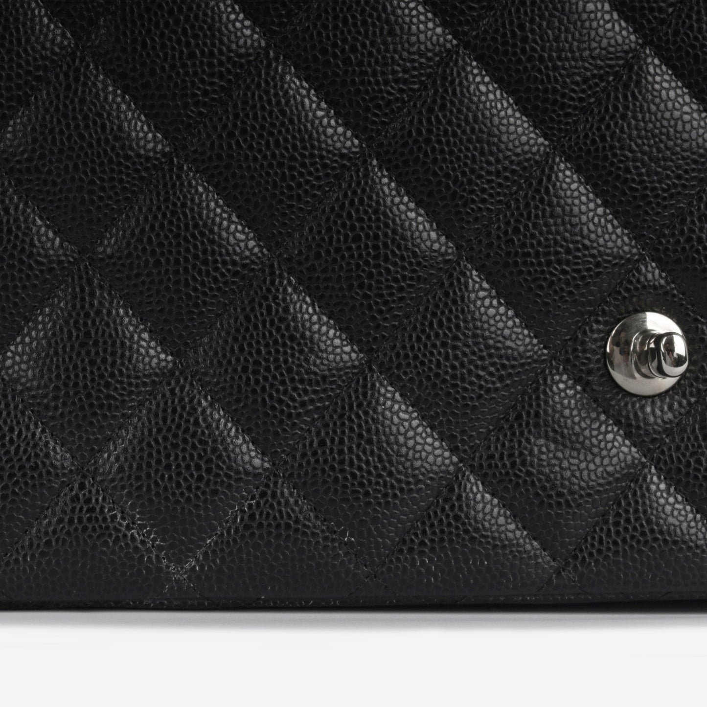 Chanel Maxi Classic Flap - Black Caviar