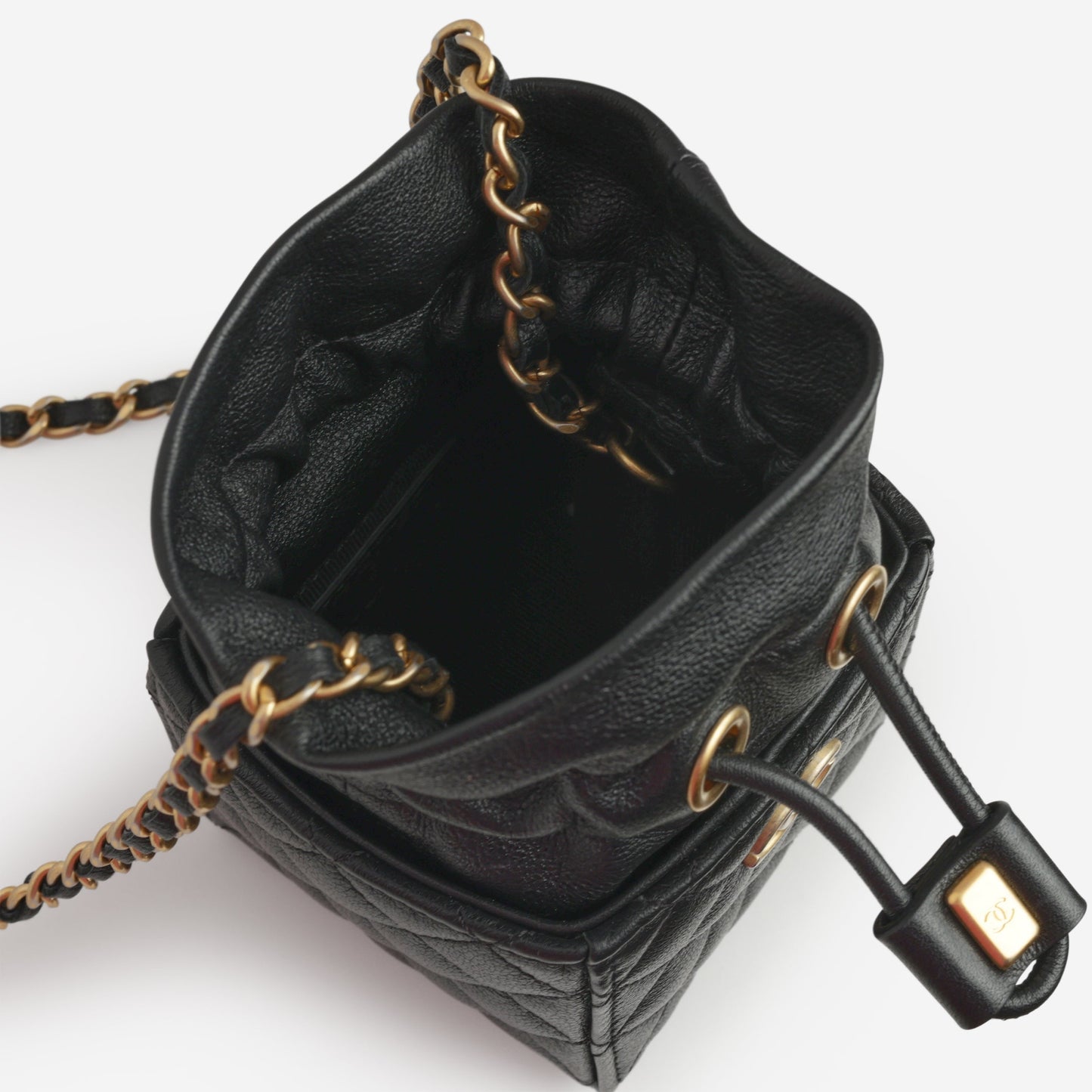 Chanel Micro Drawstring Bucket Bag - Black Lambskin | Aged Gold Hardware