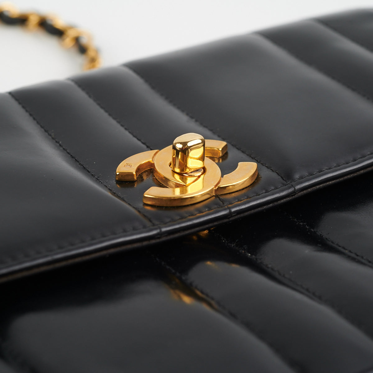 Chanel  Vertical Half Flap Black Shiny Leather