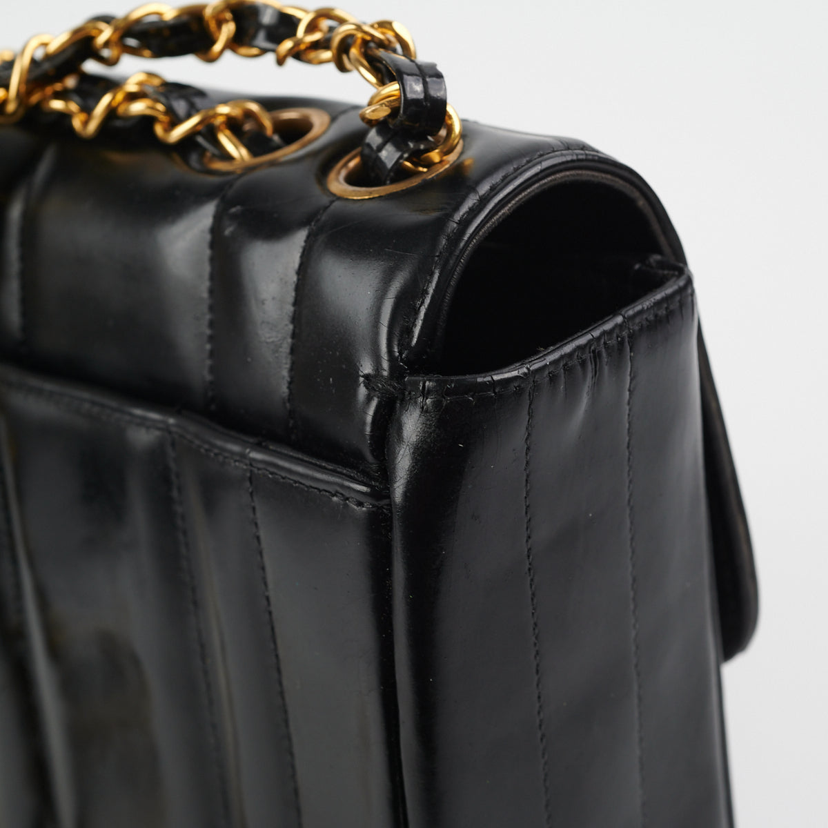 Chanel  Vertical Half Flap Black Shiny Leather