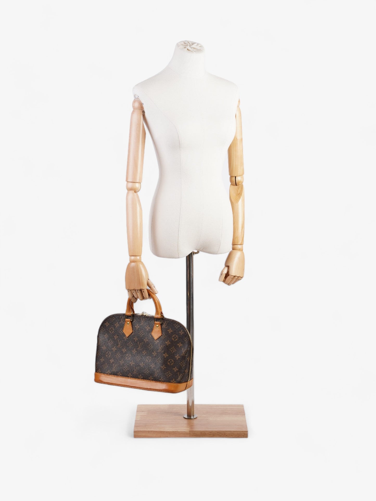 Louis Vuitton Alma Monogram Coated Canvas PM