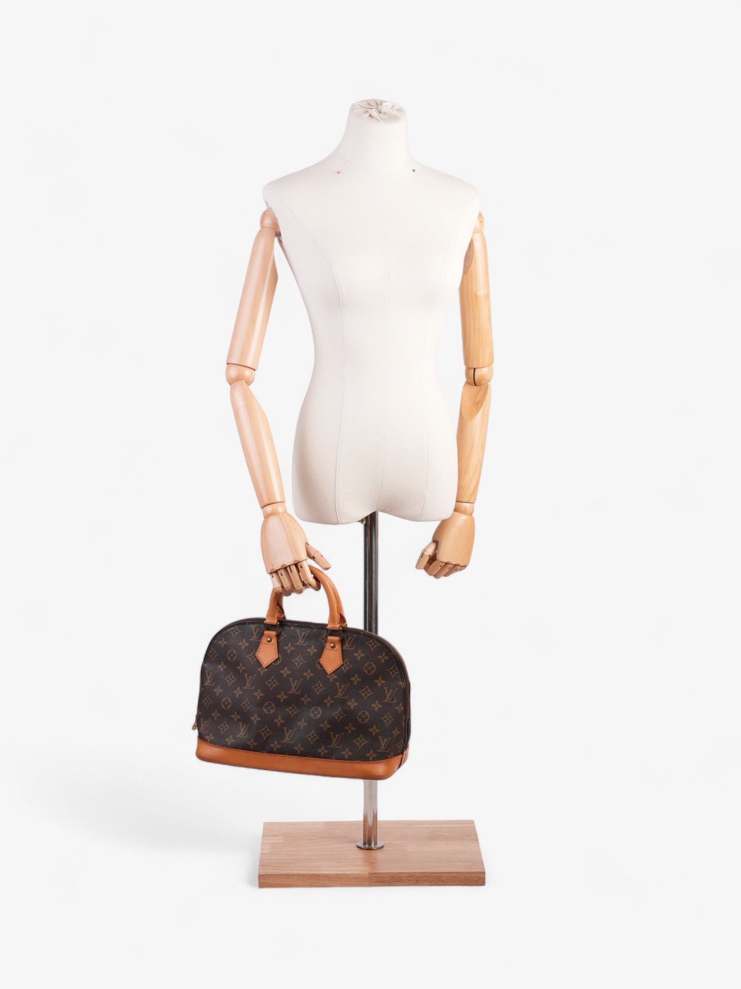 Louis Vuitton Alma Monogram Coated Canvas PM