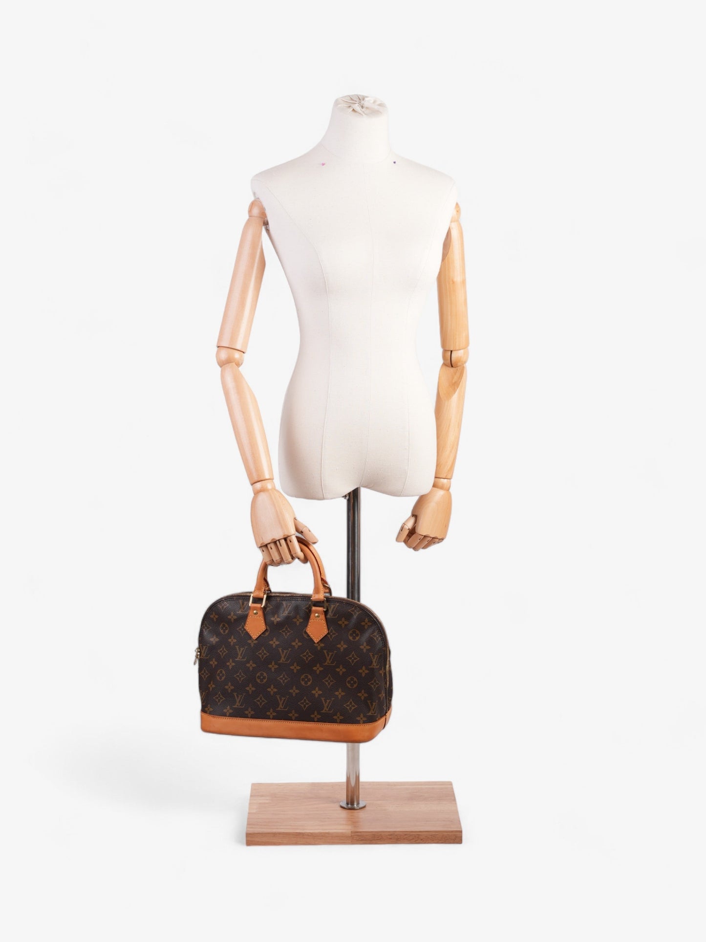 Louis Vuitton Alma Monogram Coated Canvas PM