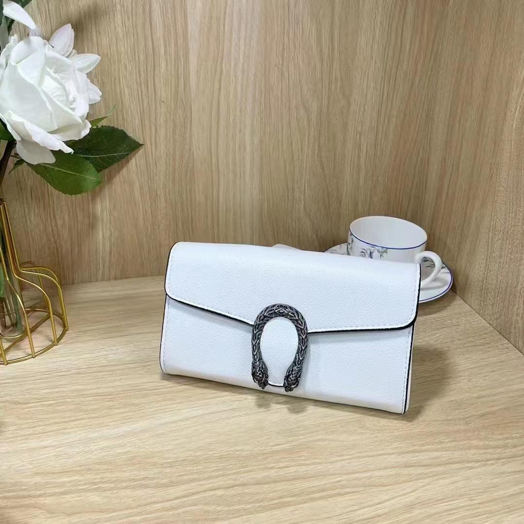 Gucci Women's Cross Body Bag -  Design with Logo, Long Chain (White)