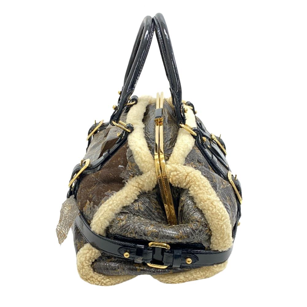 LOUIS VUITTON Mini Boston Duffel bag M95574 Patent Leather, Sheepskin Brown Handbag monogram shearling storm Women
