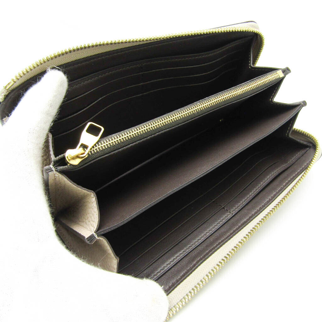 Louis Vuitton Comete Wallet Women's Veau