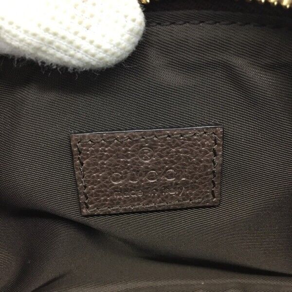Gucci Monogram Canvas Clutch
