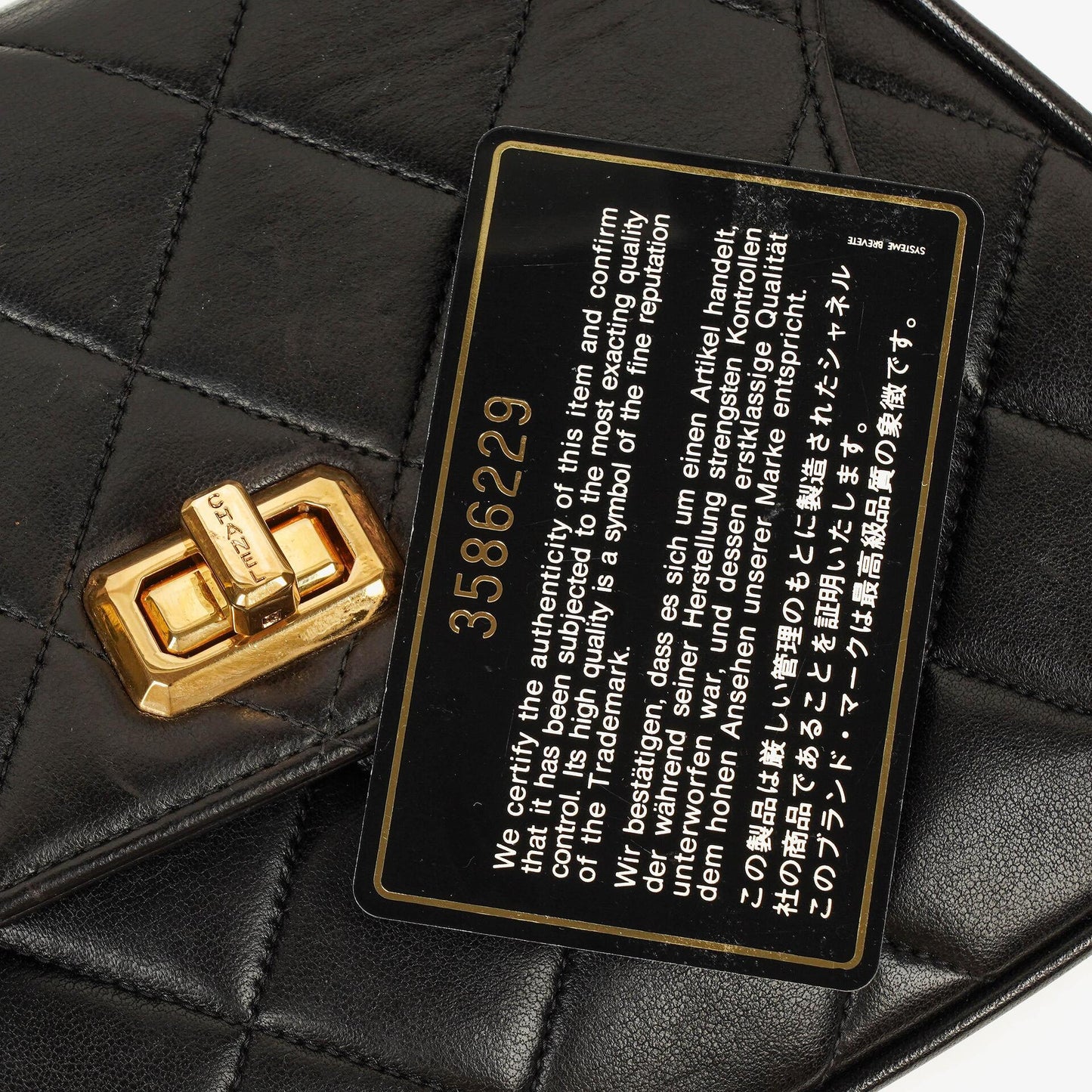 Chanel 2.55 Black Quilted Lambskin Top Handle Flap Bag