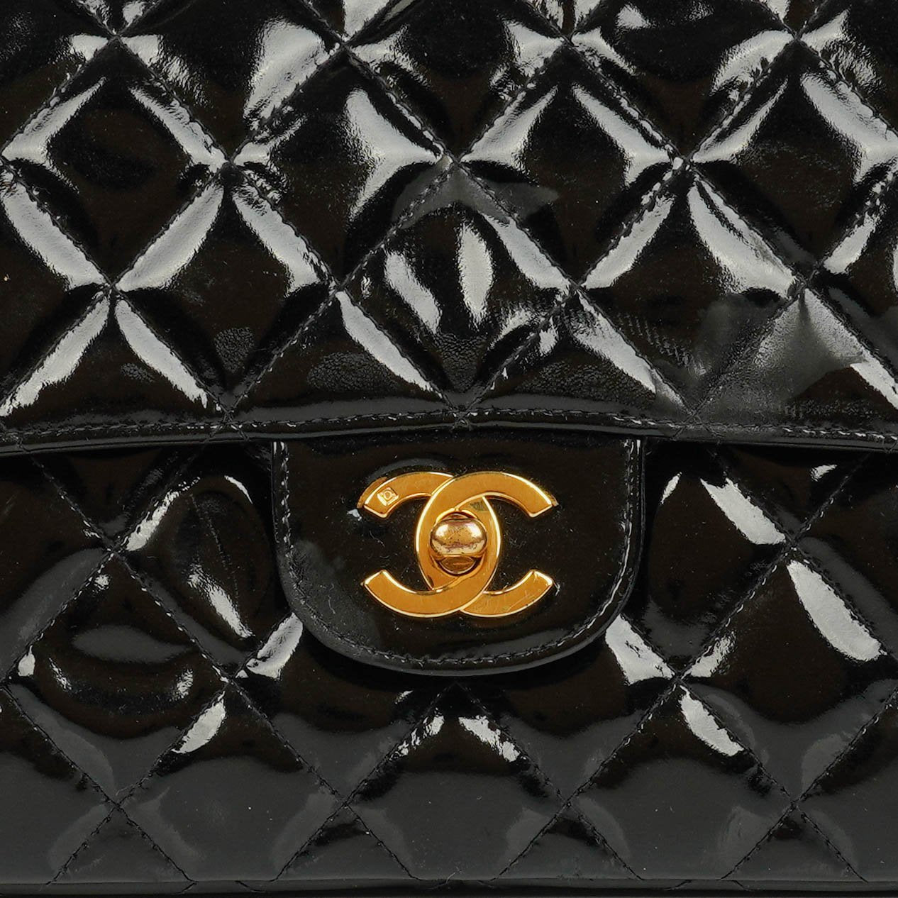 Chanel Black Double-Sided Flap Bag In Quilted Patent Leather