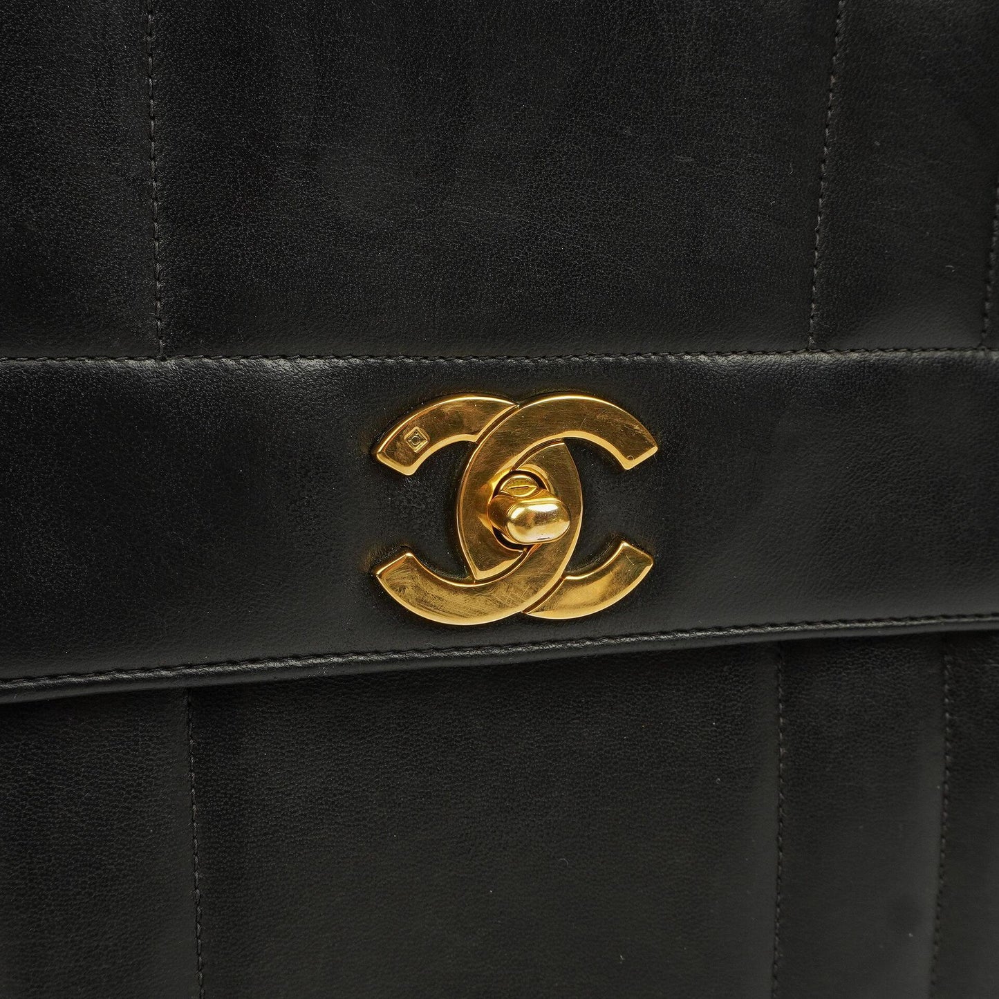 Chanel Kelly Black Vertical Quilted Lambskin Flap Bag With 24K Gold-Plated Hardware