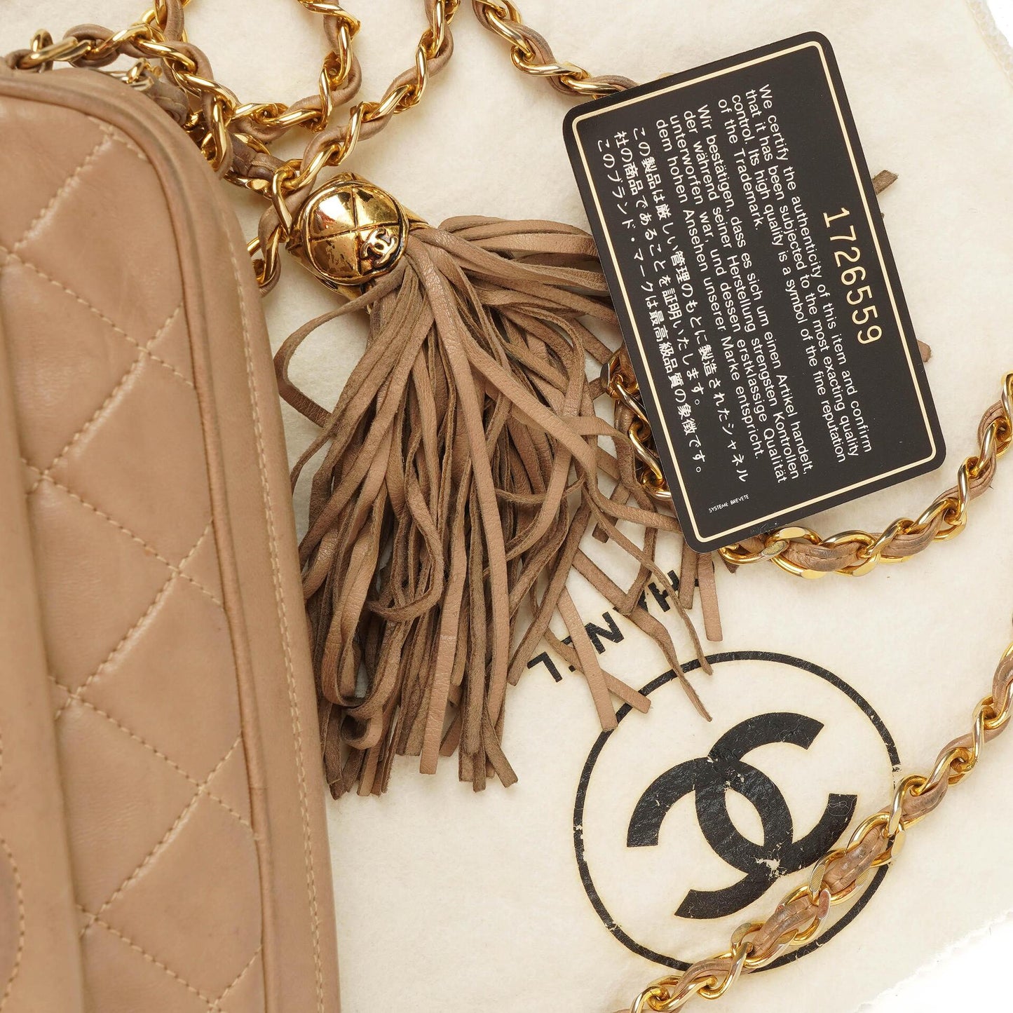 Chanel Camera Tassel CC Beige Quilted Lambskin Bag