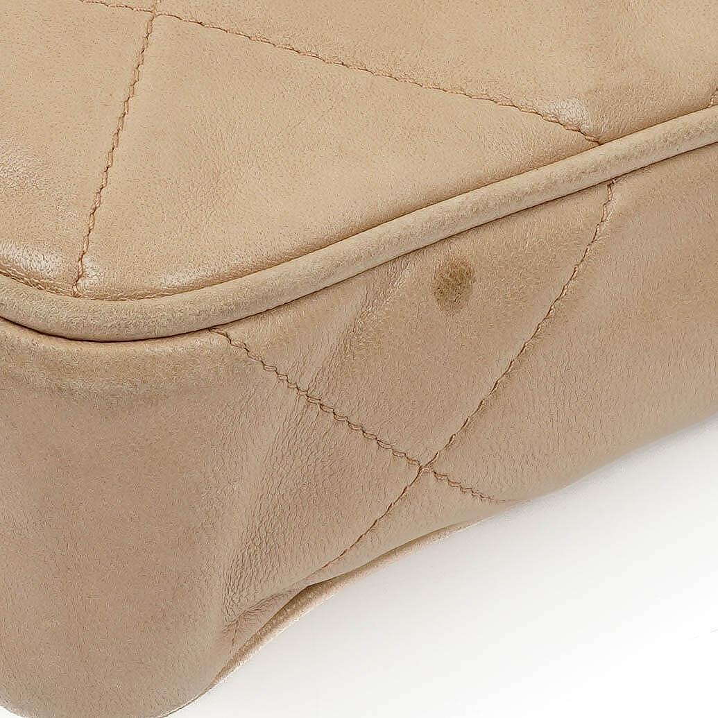 Chanel Camera Tassel In Beige Quilted Lambskin