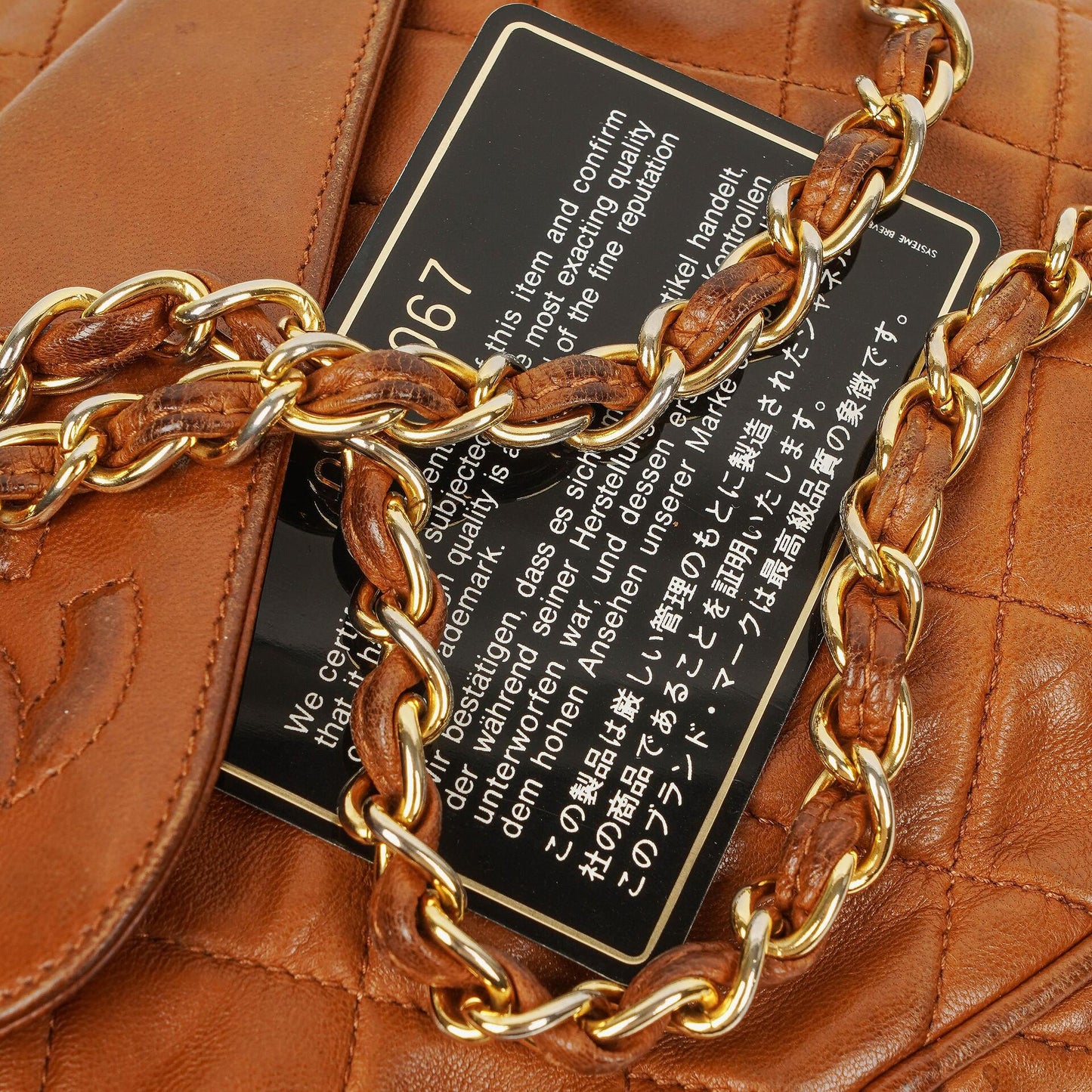 Chanel Camera Tassel Small Brown Quilted Lambskin CC Front Pocket