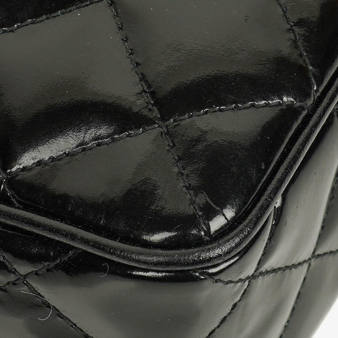 Chanel CC Black Quilted Patent Leather Camera Tassel Bag