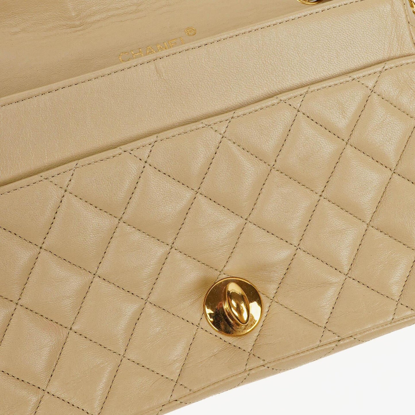 Chanel Maxi Logo Full Flap Bag Beige Quilted Leather With 24K Gold-Plated Hardware