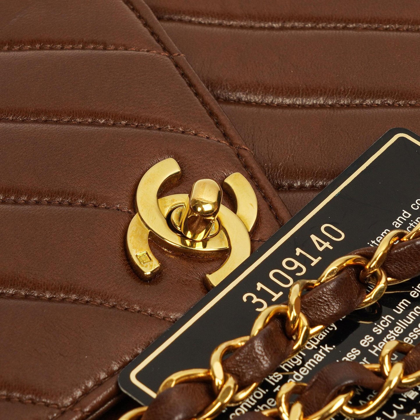 Chanel Medium Camera Tassel Brown Vertical Quilted Lambskin CC Flap Shoulder Bag 24K Gold-Plated Hardware, 1994-1996