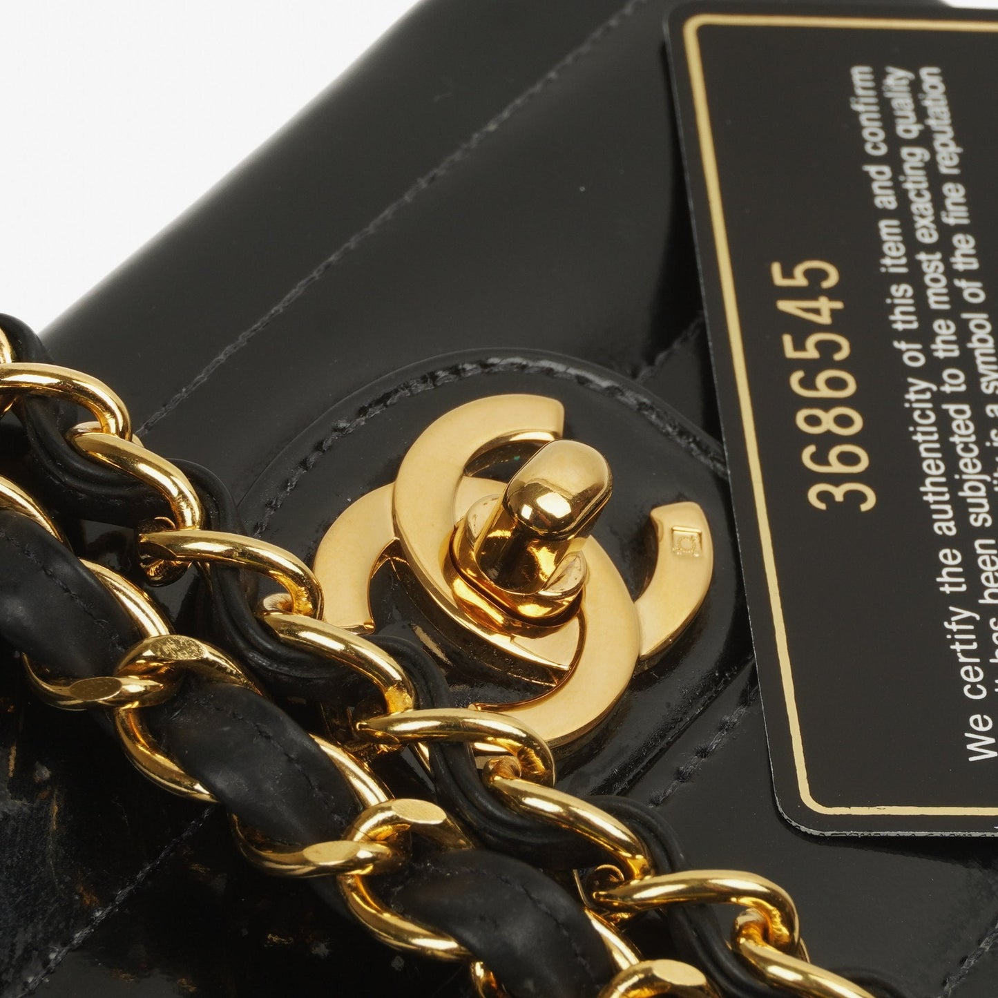 Chanel Mini Flap Square Bag in Black Horizontal Quilted Patent Leather with 24K Gold-Plated Hardware