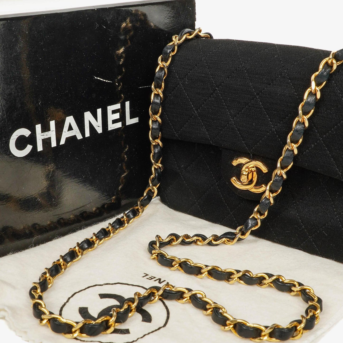 Chanel Mini Quilted Square Jersey Black Flap Bag With 24K Gold-Plated Hardware