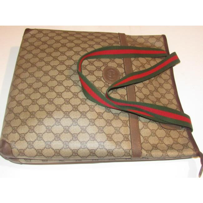 Gucci Vintage Leather And Large G Logo Print Coated Canvas In Shades Of Brown