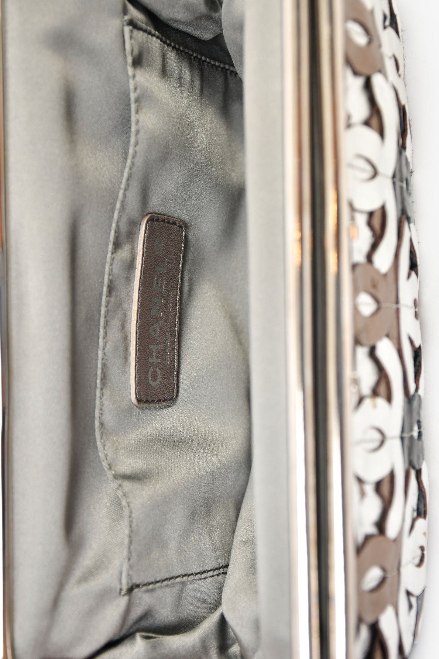 Chanel™ 2008-09 Silver/Black Leather Metallic CC Mixed Frame Clutch
