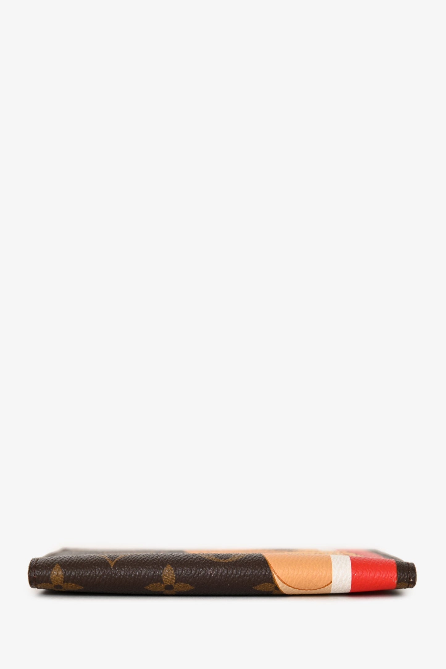 Louis Vuitton Monogram Coated Canvas Lion & Cheetah Passport Holder