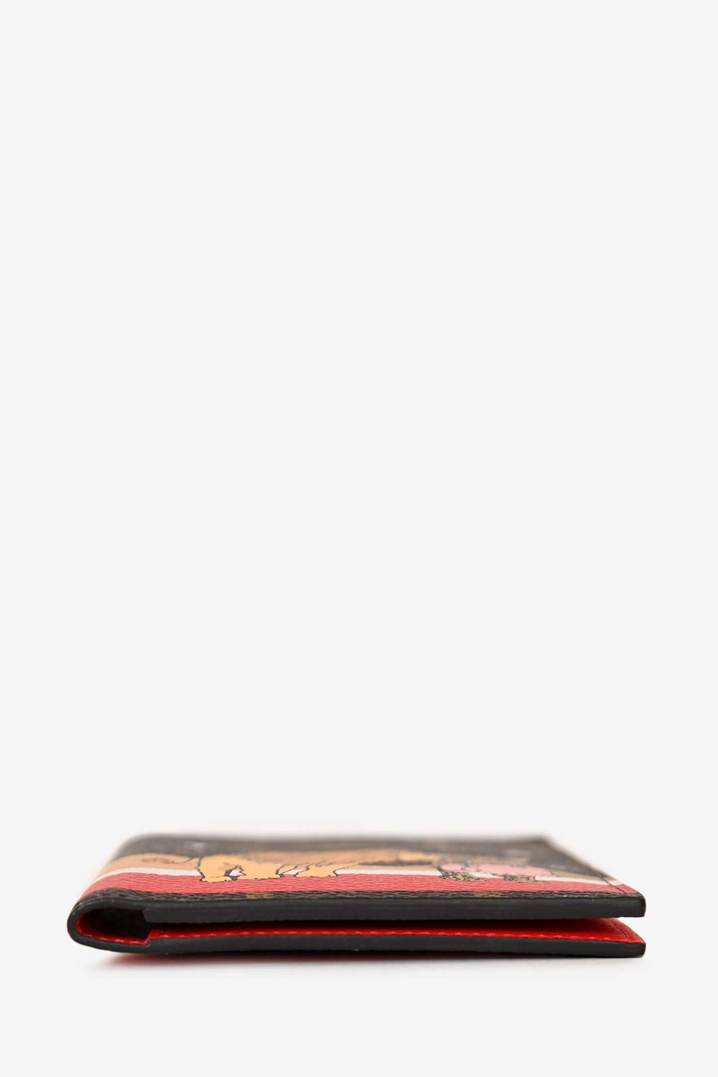 Louis Vuitton Monogram Coated Canvas Lion & Cheetah Passport Holder