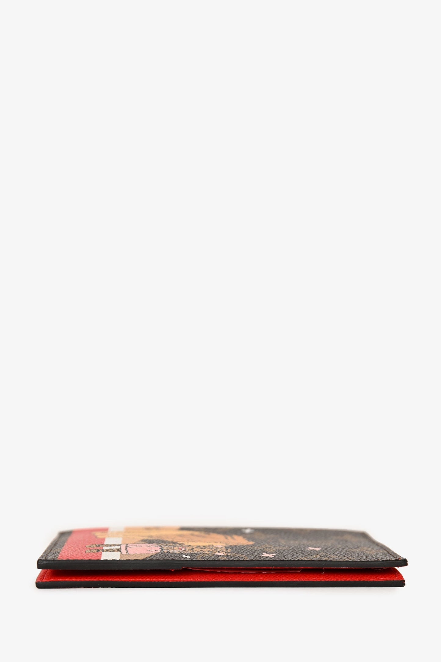 Louis Vuitton Monogram Coated Canvas Lion & Cheetah Passport Holder