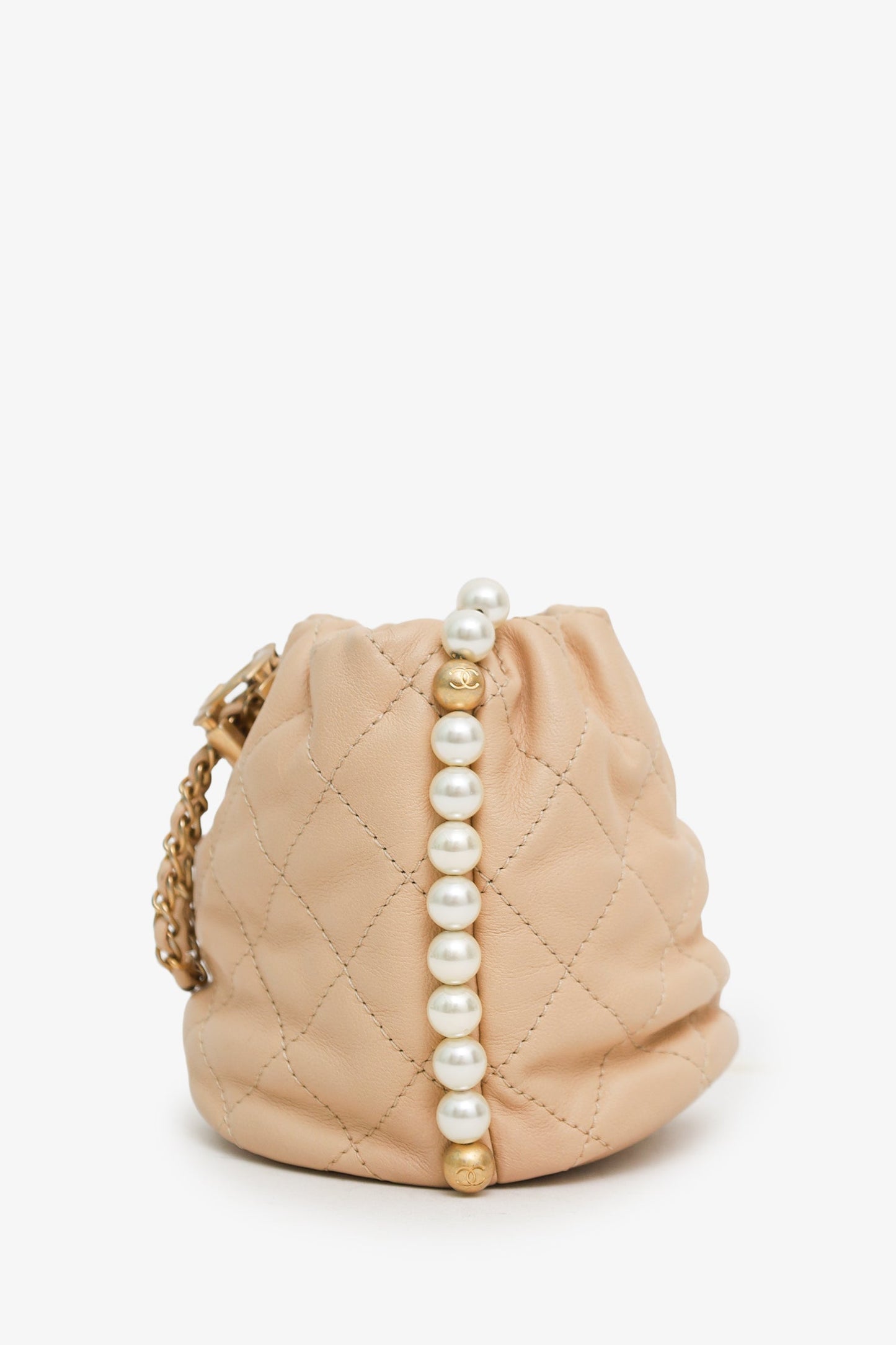 Chanel™ 2021 Beige Leather Mini About Pearls Drawstring Bucket Bag
