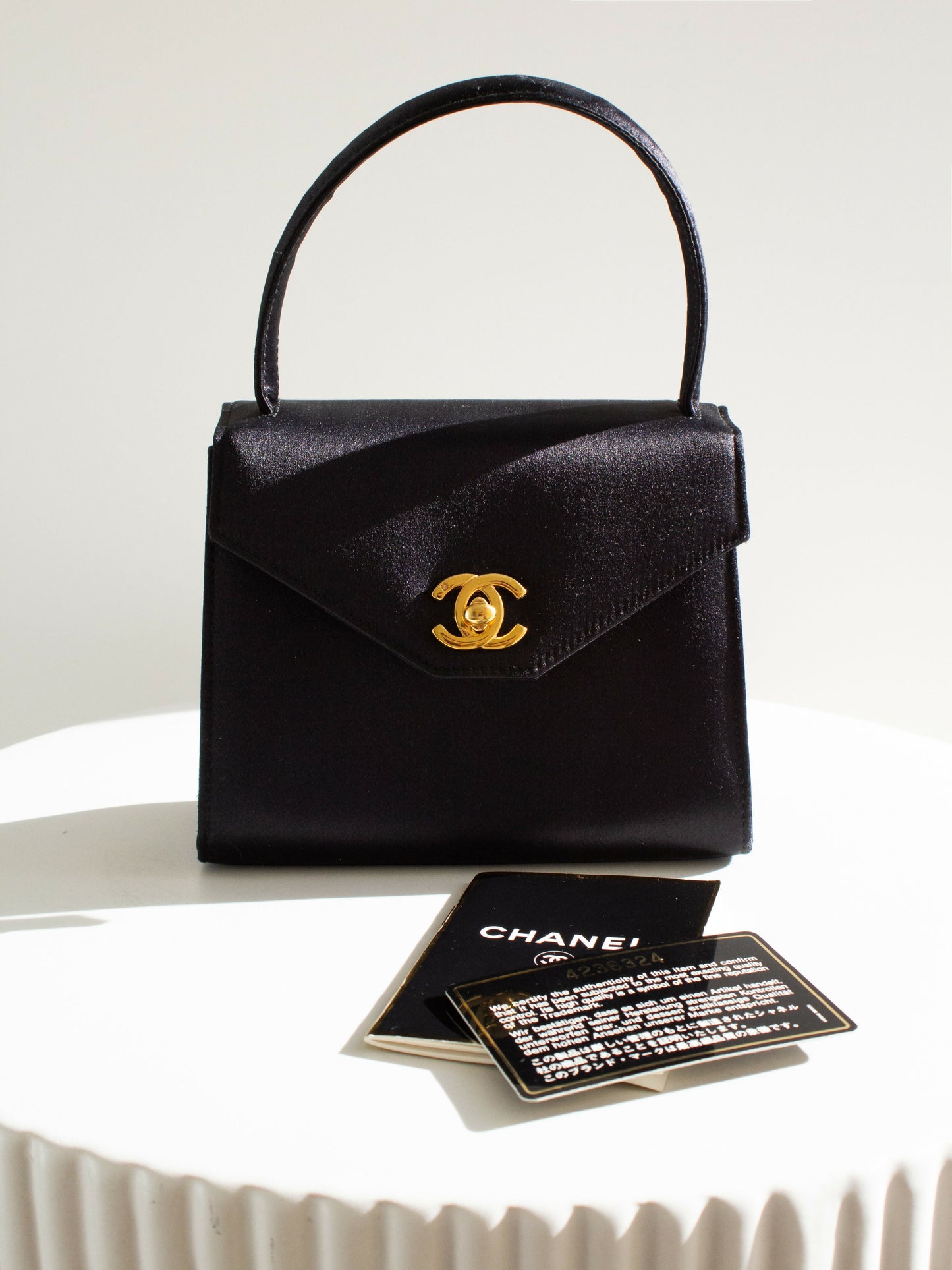 Chanel  Kelly 1996 Black Satin 24K Gold Mini Evening Bag