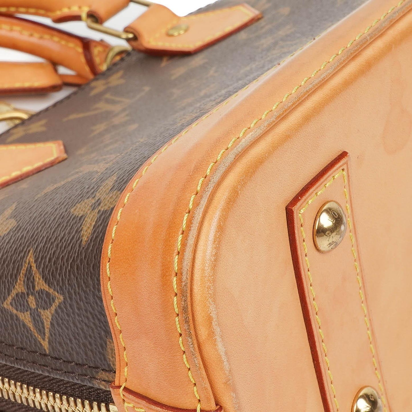 Louis Vuitton Alma BB Monogram Canvas Handbag