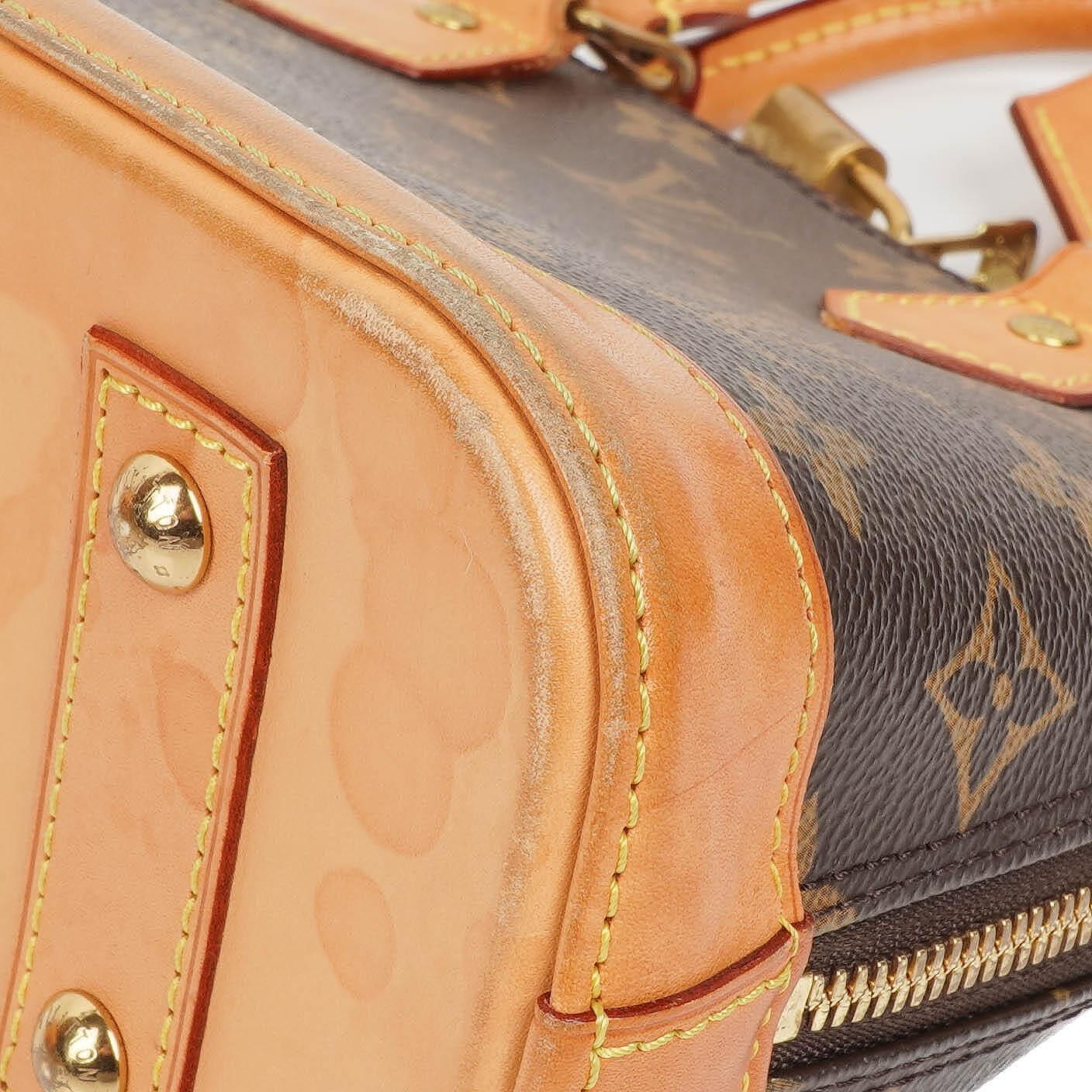 Louis Vuitton Alma BB Monogram Canvas Handbag