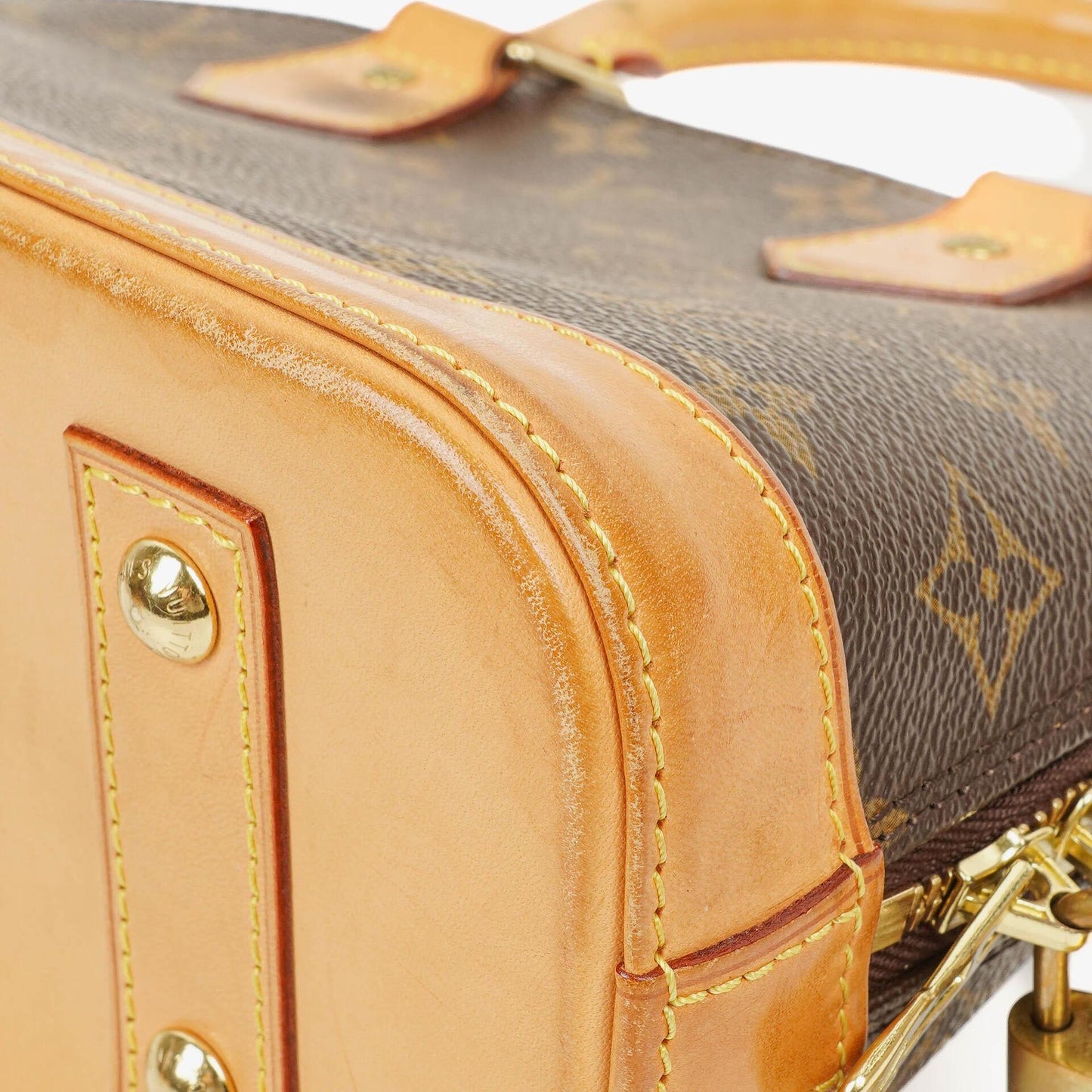 Louis Vuitton Alma BB Monogram Canvas Handbag