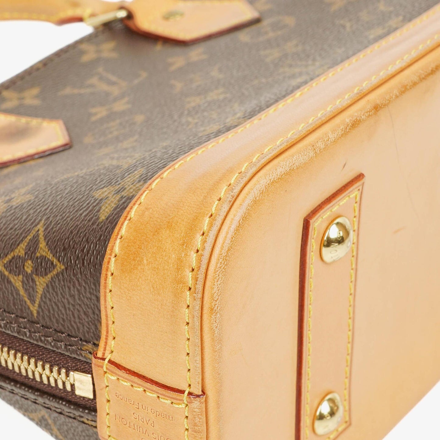 Louis Vuitton Alma BB Monogram Canvas Handbag